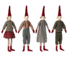 Four Maileg Christmas Pixy dolls (Size 3) dressed in festive attire, each wearing a tall red pointed hat and red shoes. These charming pixies showcase various clothing styles: one in a plaid skirt, another in a striped shirt, one in a checkered dress, and the last one in a striped sweater. Perfect as Christmas decorations, they stand in a row facing forward.