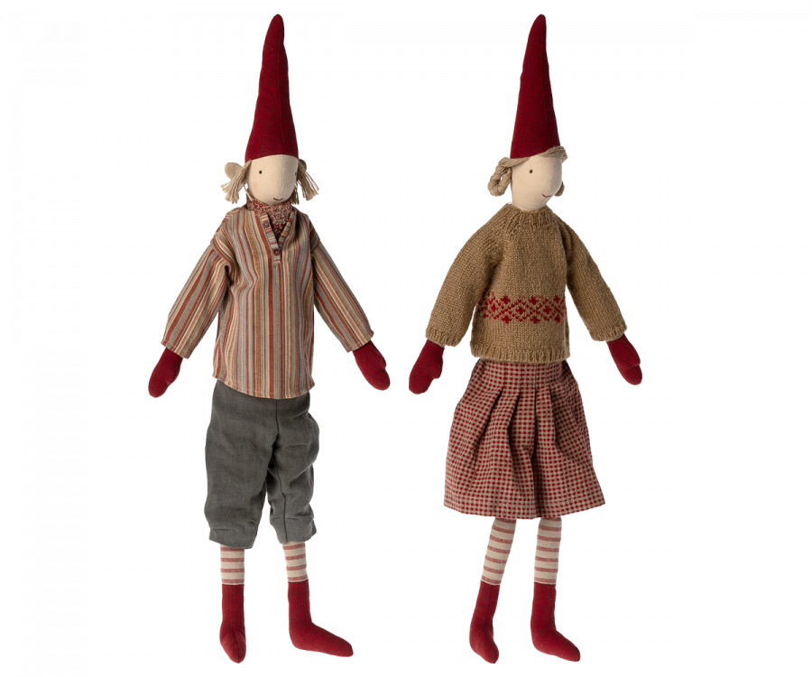 Two Maileg Christmas Pixy (Size 4) with pointed red hats, one dressed in a striped shirt and gray pants, the other in a sweater and plaid skirt, standing against a white background as an exclusive Christmas decoration
