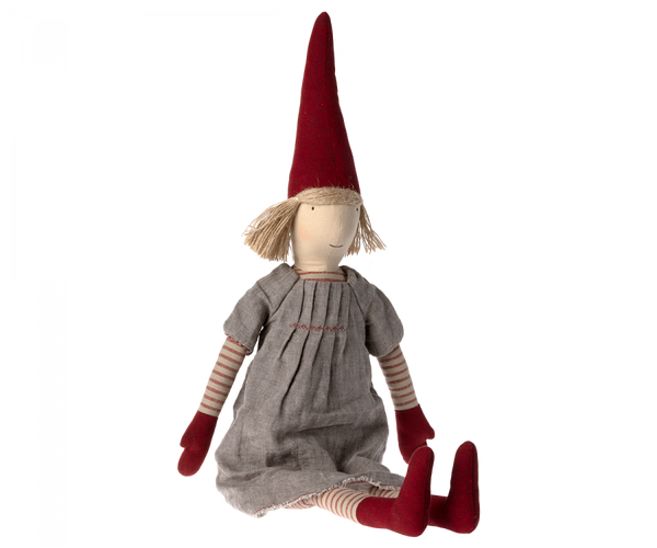 A Maileg Christmas Pixy (Size 5) with a long red hat, simple facial features, and a grey dress made from exclusive materials, sitting against a white background.