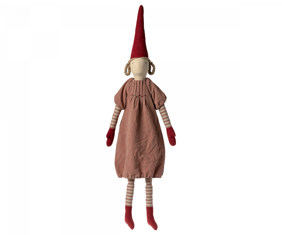 A Maileg Christmas Pixy (Size 6) with a long, pointy red hat, striped red and white legs, red mittens, and a rustic red dress made from exclusive materials, isolated on a black background.