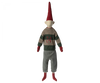 A whimsical Maileg Christmas Mega Pixy - (Size 6) with a pointy red hat, grey sweater featuring the number "24", and olive green pants, serving as a charming Christmas decoration, standing upright against a neutral background.