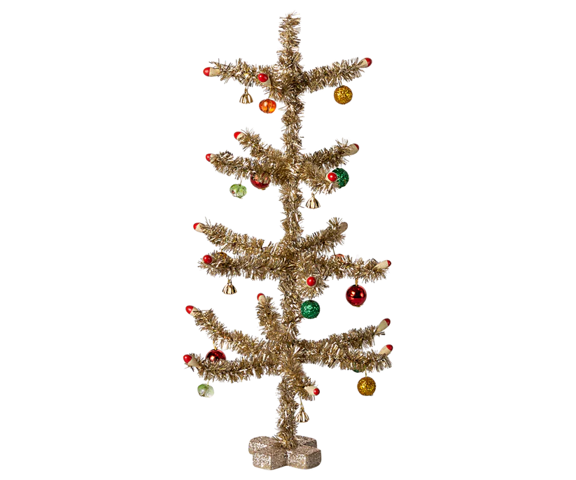 A magnificent Maileg Christmas Tree - Gold with Red and Green makes for an ideal home decoration, featuring tinsel branches adorned with red, green, and gold ornaments. Enhance the festive charm by nestling a delightful Maileg pixy among the branches to enchant your holiday setting.