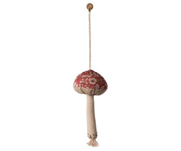 The Maileg Fabric Ornament, Mushroom - Blossom - Red features a red and white floral-patterned cap and beige stem, hanging from a brass hook—ideal for adding whimsical charm to your Christmas tree décor.