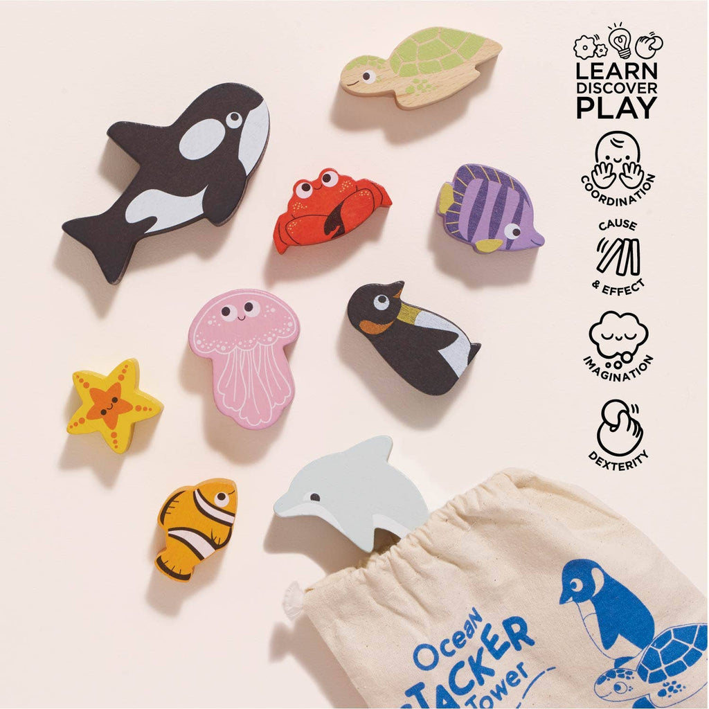 Ocean Life Stacking Animals & Bag, featuring a whale, crab, turtle, and more wooden ocean animals, are arranged on a light surface with the included cloth bag. Sensory play benefits are shown with icons and text to the right.