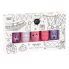 A set of five colorful, water-based Nailmatic nail polishes in a cartoon-themed packaging with illustrations of a party and gifts, labeled "made in France." Each polish bottle has a playful, happy face design.