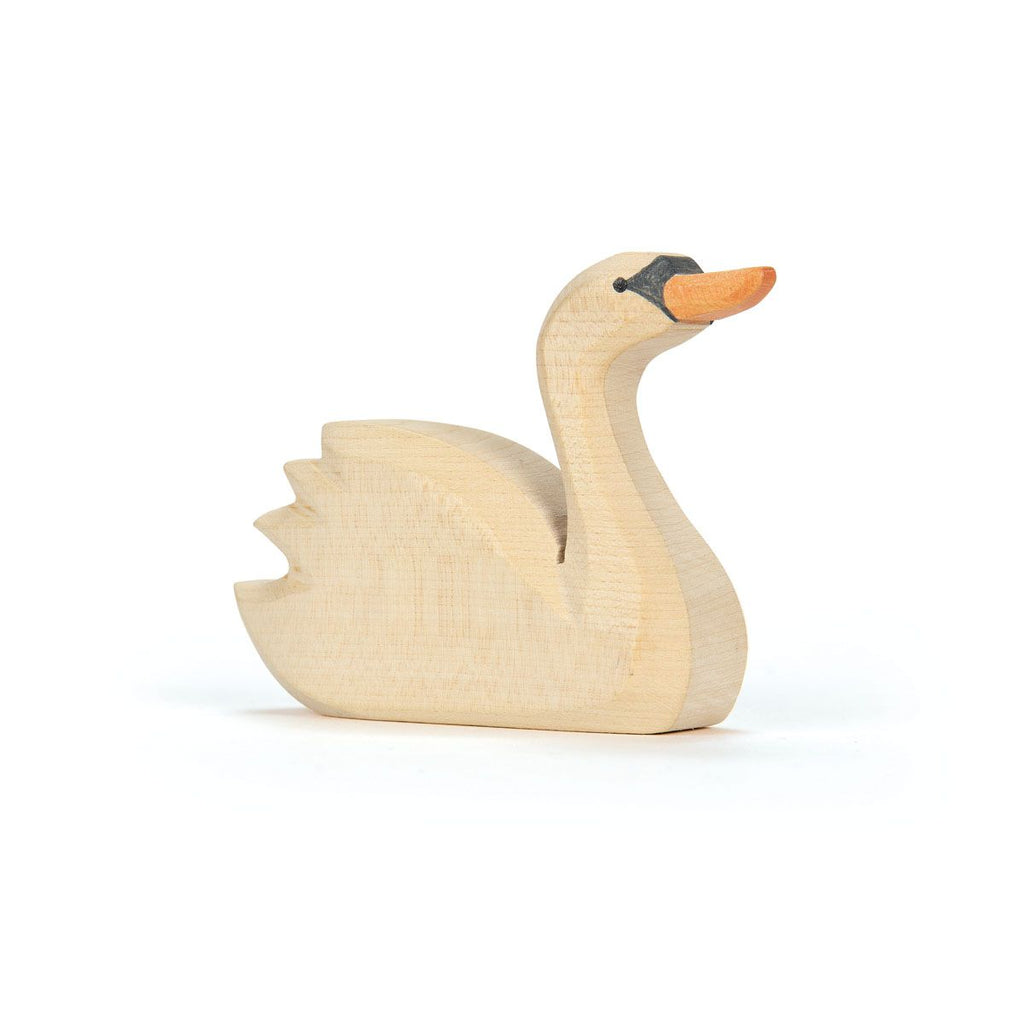 The Ostheimer Swan, Head High features a natural wood finish, orange beak, black eye markings, and carved feather details—a handcrafted, non-toxic toy ideal for collectors or children. Shown against a white background.