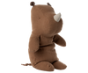 A Maileg Rhino, Medium - Chocolate plush toy with small ears, a short horn, and a tail, made from soft fabric, sits upright against a plain white background.