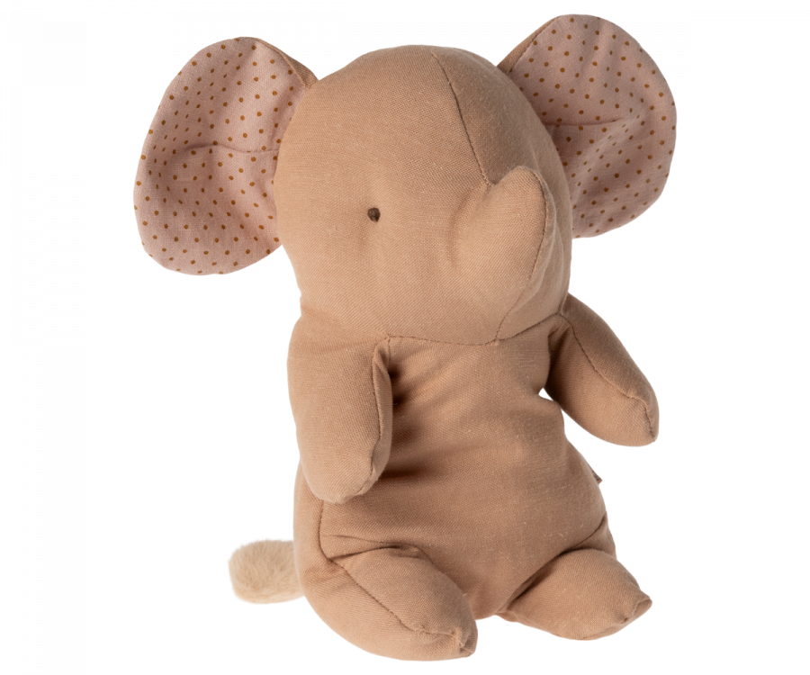 A Maileg Small Elephant with large floppy ears and tiny black eyes sits against a white background. The ears feature a pattern of pink polka dots. This huggable friend is crafted in the softest fabric, making it perfect for cuddles.