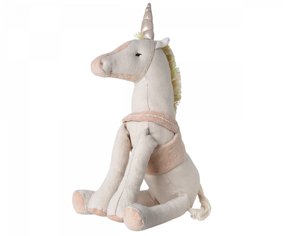 Easter Basket Set Maileg unicorn sitting on a white background, featuring a pastel mane and tail, a shiny horn, and detailed stitching.