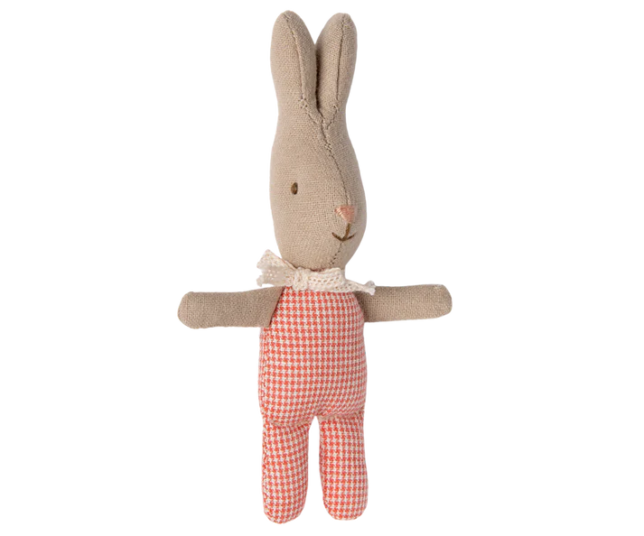 The Maileg My Rabbit - Red Check is a fabric bunny toy featuring beige ears, a smiling face, and an outfit in red and white checkered pattern, complete with charming rabbit-themed accessories like a small white scarf.