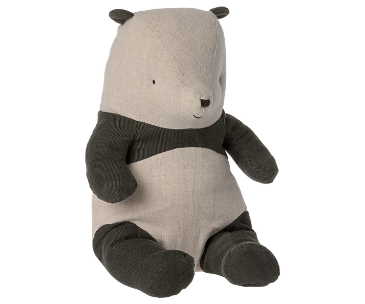 The Maileg Panda Stuffed Animal, Medium is a soft, stuffed bear resembling a panda with a beige face and torso, complemented by black ears, arms, and legs. Crafted from cotton, this adorable bear features a small embroidered nose and eyes that give it an irresistibly cute and cuddly appearance. It sits upright with its legs extended in front.