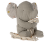 A Maileg Lullaby Friends - Elephant - Iron grey (Plays Music) made from gray fabric with large, floppy ears that have multicolored polka dots. Sitting and holding a knotted cloth with similar patterns, this baby toy is soft and cuddly. Imagine it as the perfect addition to a gift box while playing Mozart's lullaby softly in the background.