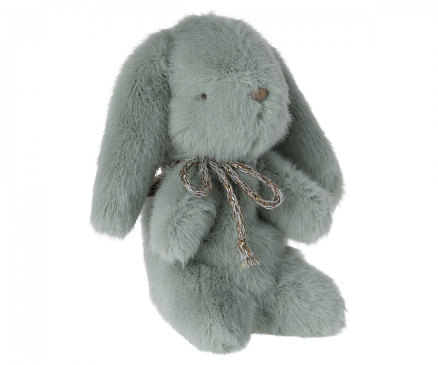 A soft, plush Maileg Mini Plush Bunny - Mint toy with long ears and a decorative brown string tied around its neck, isolated on a white background.