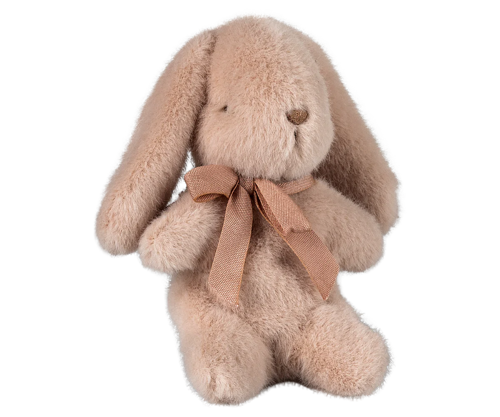 The PRE-ORDER: Maileg Plush Bunny - Light Powder is an eco-friendly, fluffy beige stuffed bunny with long ears, crafted from soft plush fabric and featuring a light brown ribbon around its neck. It ships late February.