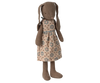 The Maileg Bunny, Size 2 - Brown - Dress features a soft brown fabric with long ears and a beige dress decorated with blue and brown floral patterns, displayed upright against a plain background.