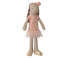 The Maileg Bunny, Size 2 - Classic, wears a ballet suit and rose skirt, featuring a pink headband with pompom and gold shoes. The doll stands upright against a neutral background.
