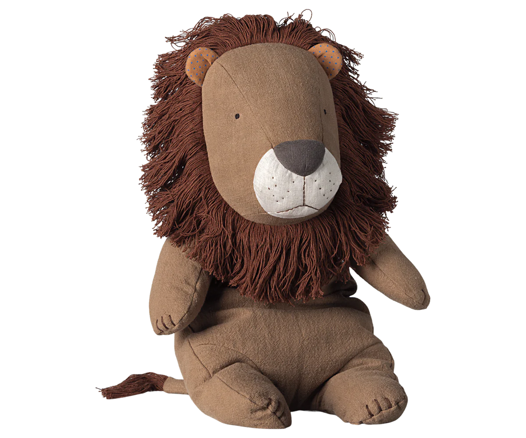 Part of the Safari Friends Collection, the Maileg Safari Friends - Big Lion features a fluffy dark brown mane, light brown body, soft fabric, and simple facial expression. Its small eyes and stitched mouth bring comfort to any child's playtime. Pre-order now for February shipping!.