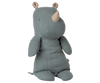 The Maileg Medium Rhino - Dusty Blue, from the Safari friends collection, is a soft plush toy made with recycled polyester and patterned ear fabric, shown sitting upright against a plain background.