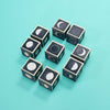 Nine Uncle Goose Moon Phase Blocks, each featuring illustrations of different lunar phases, are arranged in three staggered rows on a turquoise background.
