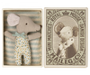 A small stuffed toy mouse in polka-dotted pajamas is nestled in a box lined with striped fabric. The box features a vintage-style illustration of Mom Mouse wearing a crown, labeled "Royal Mouse, Danish Design, Maileg & Co. Mini Matches," making it the perfect addition to any Maileg Nursery Room Starter Set.