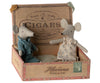 Two Maileg Mum & Dad Mice in Cigar Box, one dressed in green overalls and the other in a floral dress, sitting inside an open, decorative "havina cigars" box.