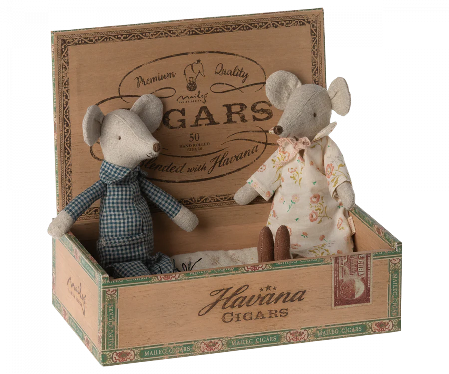 The Maileg Grandparents Set features two mice in patterned outfits sitting in an open vintage-style "Havana Cigars" box, perfect for dollhouse décor or as a charming accent to your Maileg mouse collection.