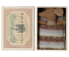 A small plush Maileg Sleepy Wakey Baby Mouse in Matchbox - Rose soft toy in a knitted sweater, snugly placed inside a vintage matchbox bed labeled "baby lucas safety matches, limited edition 1989.