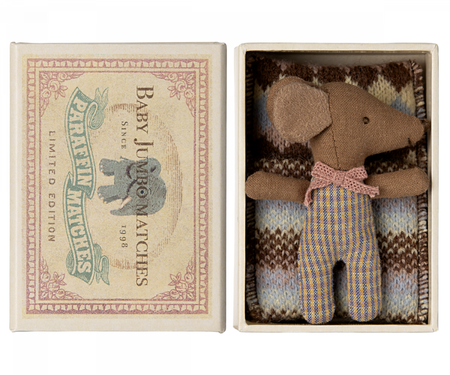 A Maileg Sleepy Wakey Baby Mouse in Matchbox - Rose, displayed in a vintage matchbox bed with a knitted blanket. The matchbox lid has "Baby Lucifers Limited Edition 1988" printed on it.
