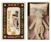 Vintage Easter Basket Set with a label illustrating a "mouse race car" theme on the left, and a handmade stuffed mouse dressed in a floral outfit lying in a crocheted bed inside the basket.