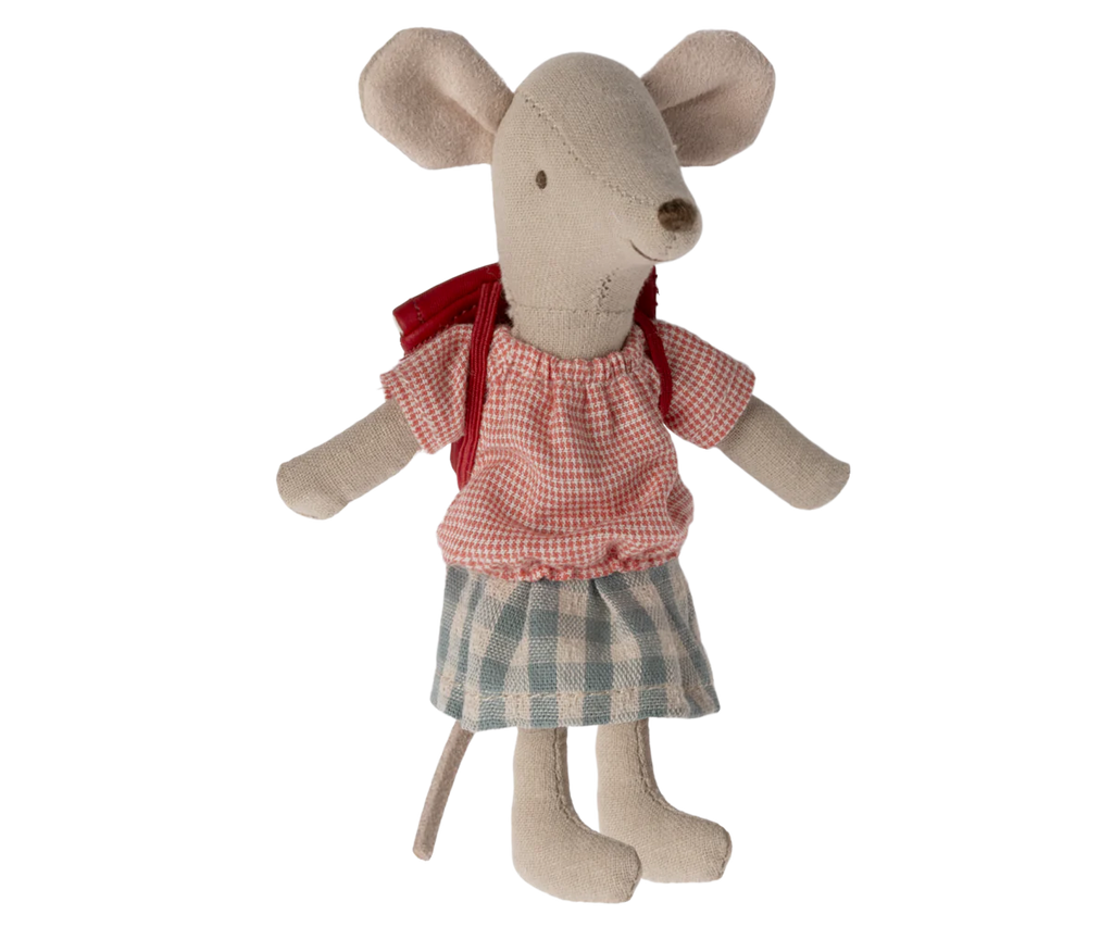 A small fabric mouse toy, affectionately known as the Maileg Big Sister With Backpack - Red, wearing a red and white checkered shirt, a blue and white checkered skirt, and a red backpack. The toy has oversized ears, a long tail, and is designed in a simple and soft-textured style.