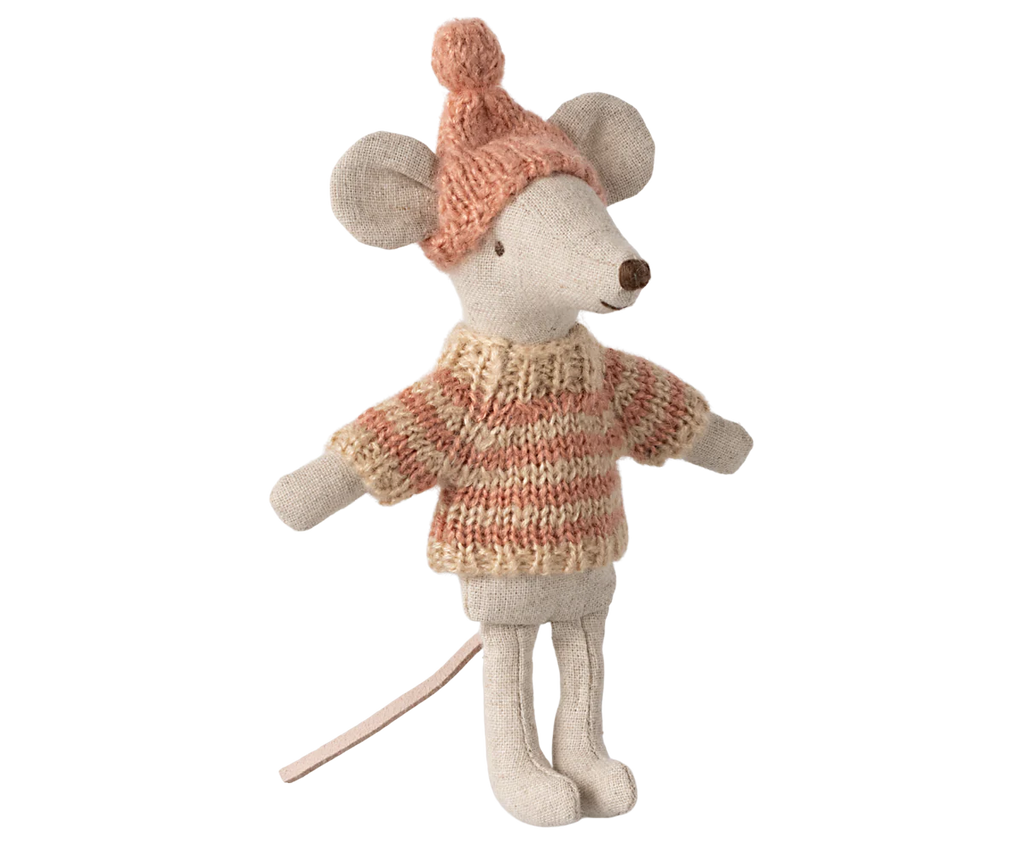 The Maileg Knitted Sweater and Hat for Big Sister Mouse features a delightful plush mouse toy dressed in a cozy pink and beige knitted sweater, complemented by an adorable pink hat with a pom-pom. Its charming design, with a long tail and small ears, makes it ideal for wintertime cuddles. Please note that this item ships in approximately one week.