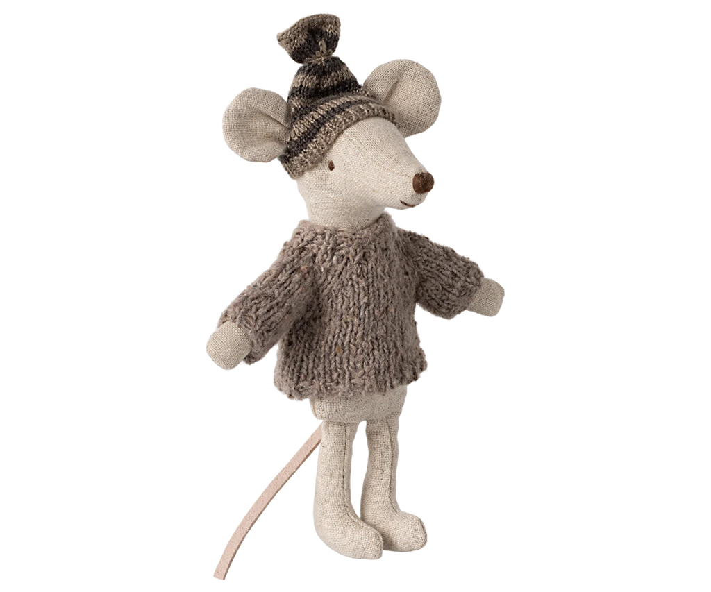 The Maileg Big Brother Mouse, from the knitted sweater and hat collection, is adorned in a cozy gray sweater and matching beanie. Featuring large ears, a long tail, and a charming smile, it's outfitted in snug winter accessories perfect for cuddling.