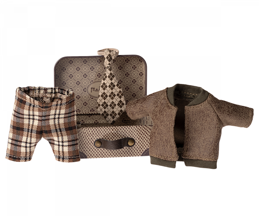 A small metal suitcase with a brown handle and a patterned interior, holding a set of miniature clothing. Inside are plaid pants, a brown jacket with a green collar, and a beige and brown checked tie—perfectly designed as Maileg Jacket, Pants And Tie In Suitcase, Grandpa Mouse.