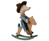 The Maileg Cowboy Mouse On Rocking Horse, Little Brother—wearing a brown hat, blue checkered shirt, and jeans—sits on a green and brown rocker, adding adventurous charm to any play set. Ships in one week.