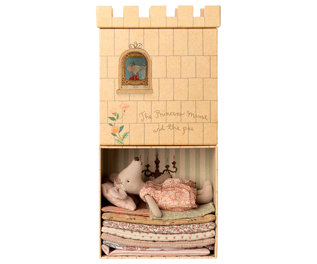 The PRE-ORDER Maileg Princess and The Pea Big Sister Mouse features a princess mouse in pink atop patterned mattresses in a castle box—an enchanting playset for fairy tale fans. Estimated ship date: mid November.