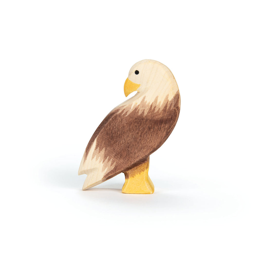 The Ostheimer Bird - Bald Eagle, Standing features hand-painted brown wings, a white head, and yellow beak and feet—perfect for imaginative play and inspired by classic Ostheimer toys. Stands upright on a white background.