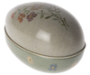 An oval-shaped, fabric-covered Maileg Easter Egg embellished with intricate Dorthe Mailil embroidery in pastel hues. The egg is gently curved on the top and has a soft, elegant appearance.