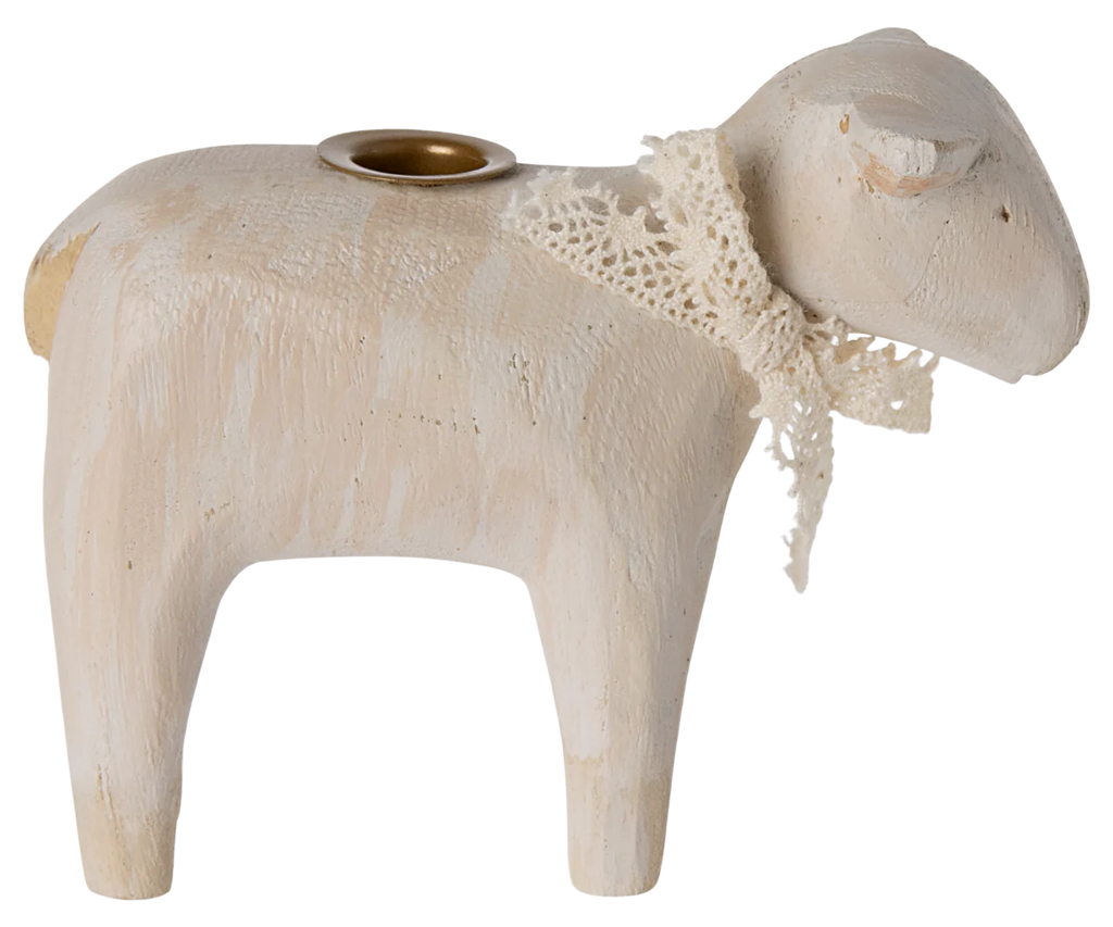 The PRE-ORDER: Maileg Wooden Candle holder - Off White Lamb is a handmade wooden sheep figurine with a lace ribbon and a small round candleholder on its back, featuring a light natural finish, ideal for your Easter table decor. Ships late January.