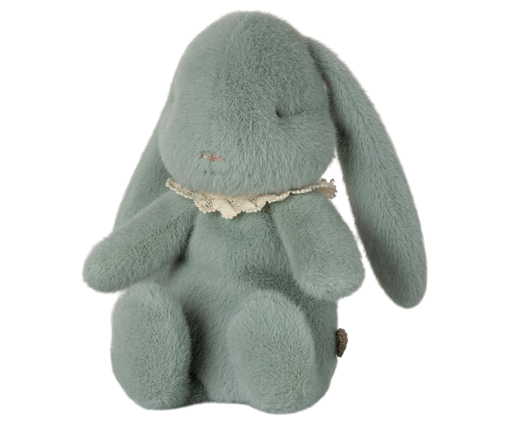 The PRE-ORDER: Maileg Easter Egg With Bunny - Mint (Ships in February) features a soft, plush green rabbit toy made from recycled polyester with long ears and a stitched pink nose, wearing a lace collar. It has minimalist stitched eyes and sits upright against a plain white background.