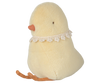 The PRE-ORDER: Maileg Easter Egg With Chick features a plush chick toy with creamy yellow recycled polyester fur, an orange beak, small black eyes, and a lace collar. Safe for all ages, it sits upright with visible orange feet. Ships in February.