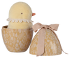 The PRE-ORDER: Maileg Easter Egg With Chick, shipping in February, includes a plush yellow chick with a lace collar nestled inside a decorative egg-shaped container made of recycled polyester. This container showcases a floral pattern and is topped with a pink bow.