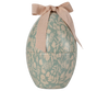 The Maileg Easter Egg - Mint is a decorative metal container with a white floral pattern on a light green background, featuring a textured pink ribbon bow. Available for pre-order, ships in February.