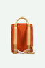 A Sticky Lemon Backpack Medium | Envelope | Campfire Orange is displayed from the back against a plain light background, featuring a medium-sized orange body with yellow straps and handles, white plastic buckles, and a waterproof lining made from recycled PET.