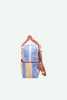 The Sticky Lemon Backpack Small | Stripes | Cloud Blue + Twiggy Beige features vertical beige and blue stripes, a white zipper, brown-orange strap, top handle, recycled PET material with waterproof lining, shown on a light grey background.