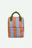 Sticky Lemon Backpack Medium | Stripes | Cloud Blue + Maple Whirl—a square-shaped medium backpack adorned with vertical orange and light blue stripes, equipped with two green handles and a white side tag. Crafted from recycled PET bottles with a waterproof lining, displayed against a plain light background.