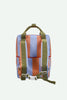 A Sticky Lemon Backpack Medium | Stripes | Cloud Blue + Maple Whirl—crafted from recycled PET bottles with a waterproof lining—features wide vertical orange and light blue stripes, green adjustable shoulder straps, a top handle, and a white buckle, and is shown against a light background.