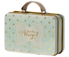 A charming Maileg Suitcase, Small in pastel green, decorated with gold stars, a white angel wings illustration, and the words “Guardian Angel” on the front. Perfect for gift storage or carrying small soft toys, it features a beige fabric handle and sturdy metal edges.