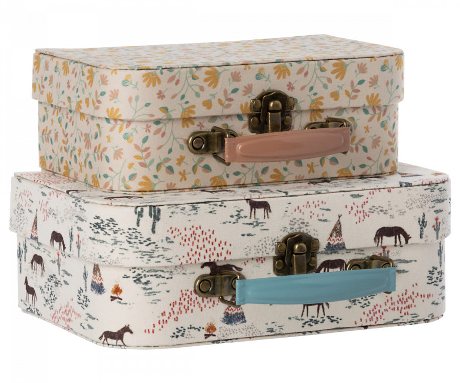A stack of Maileg 2 Piece Suitcase Set with beautiful fabric prints.