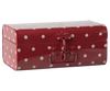 The Maileg Storage Suitcase - Red with Dots is a rectangular red metal case with rounded edges, white polka dots, glossy finish, and a front latch—ideal as a small Maileg suitcase or charming storage solution.