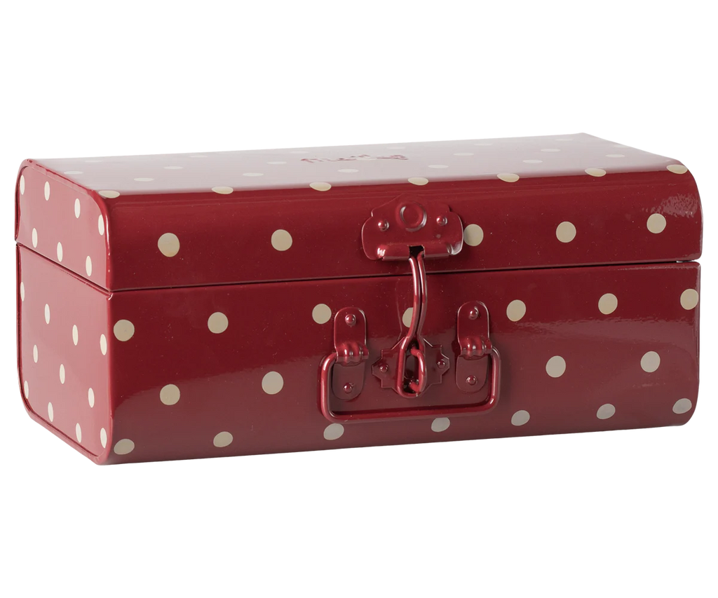 The Maileg Storage Suitcase - Red with Dots is a rectangular red metal case with rounded edges, white polka dots, glossy finish, and a front latch—ideal as a small Maileg suitcase or charming storage solution.